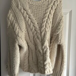 ZARA Knit Sweater. Cream colour. Oversized fit with crossed dealing on sleeves.